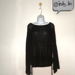 Black knitted sweater with bell sleeves